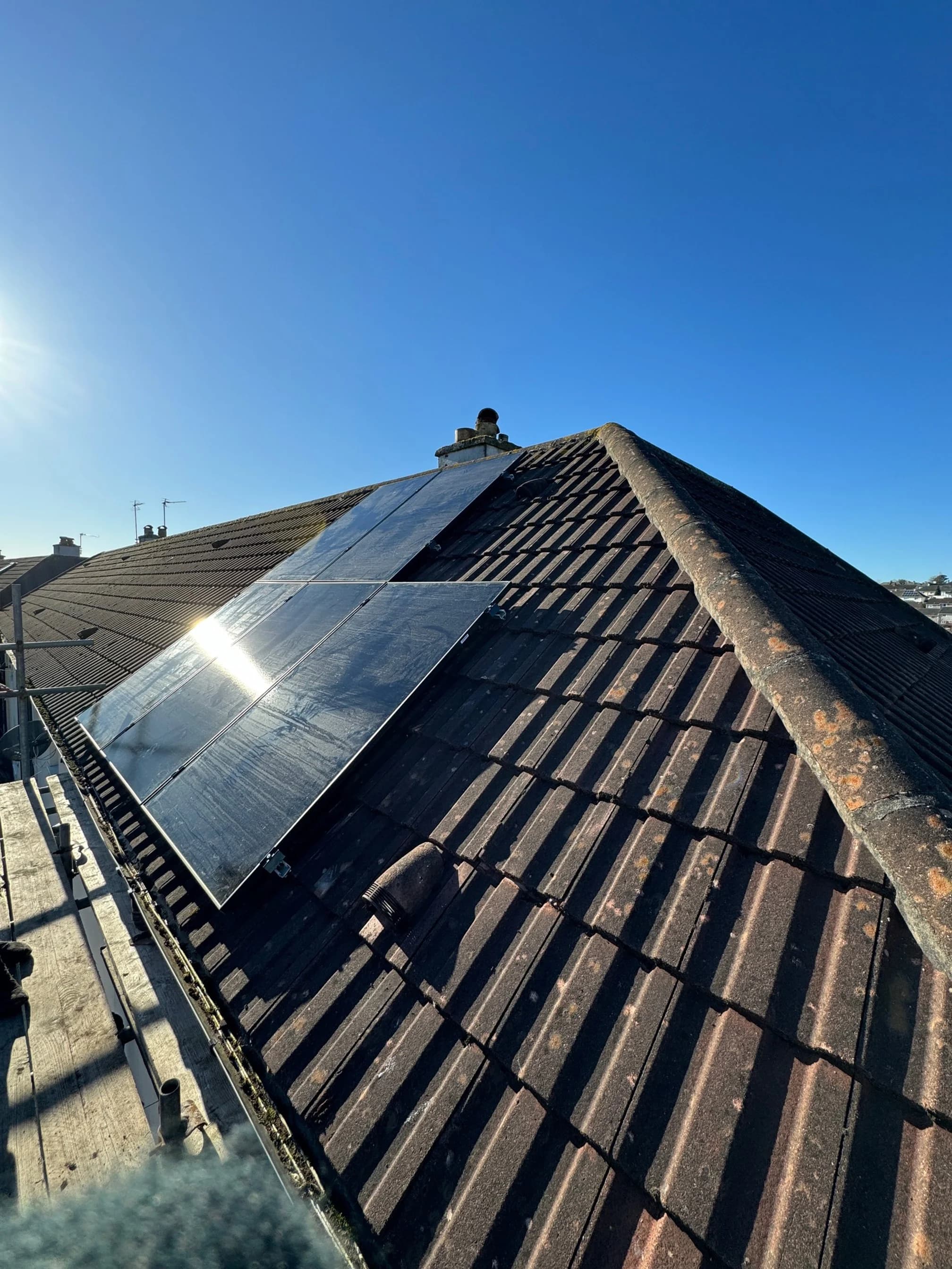 The first solar panels fixed to the tiled roof