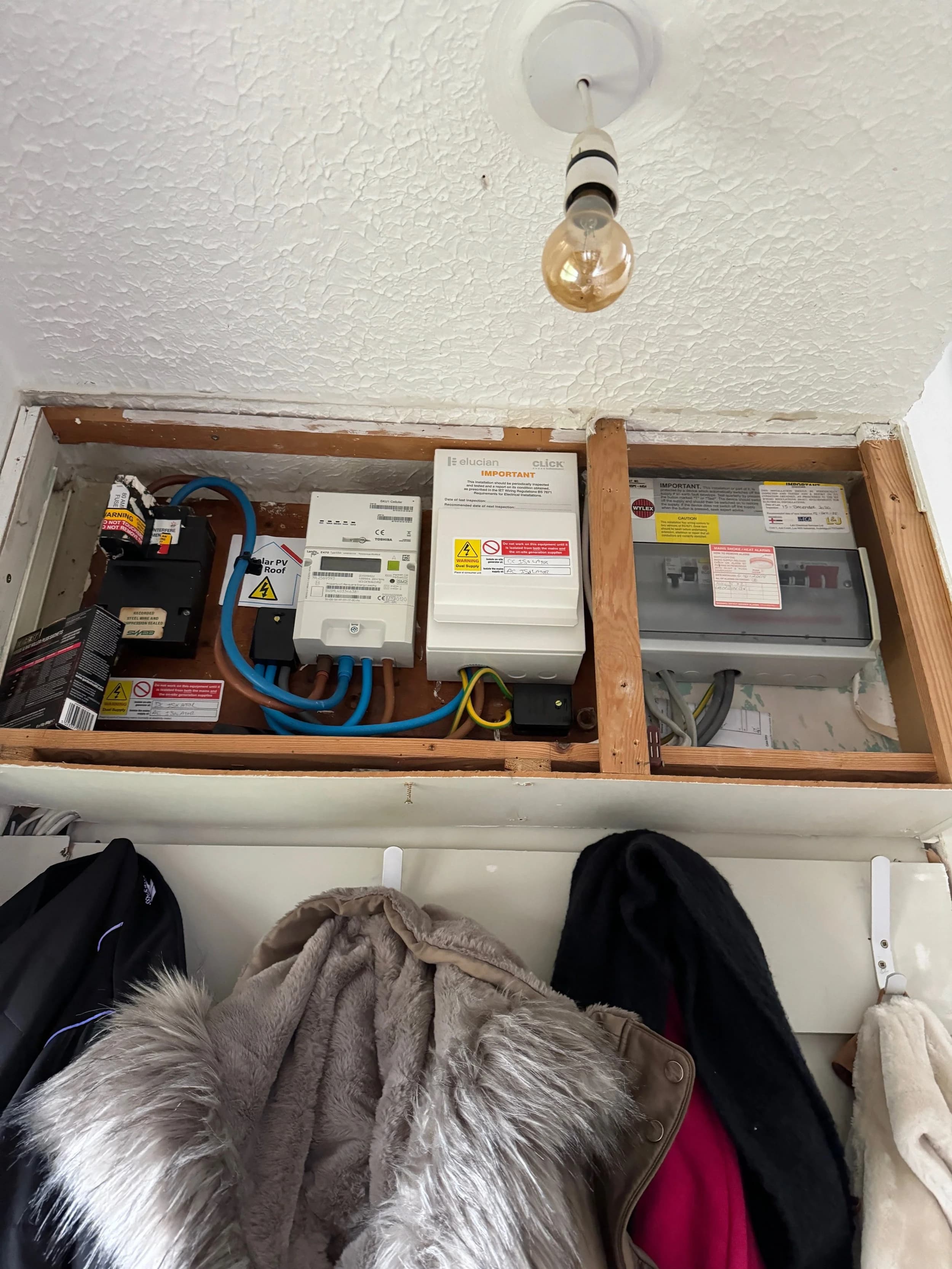 The consumer unit and meter cupboard after the solar installation
