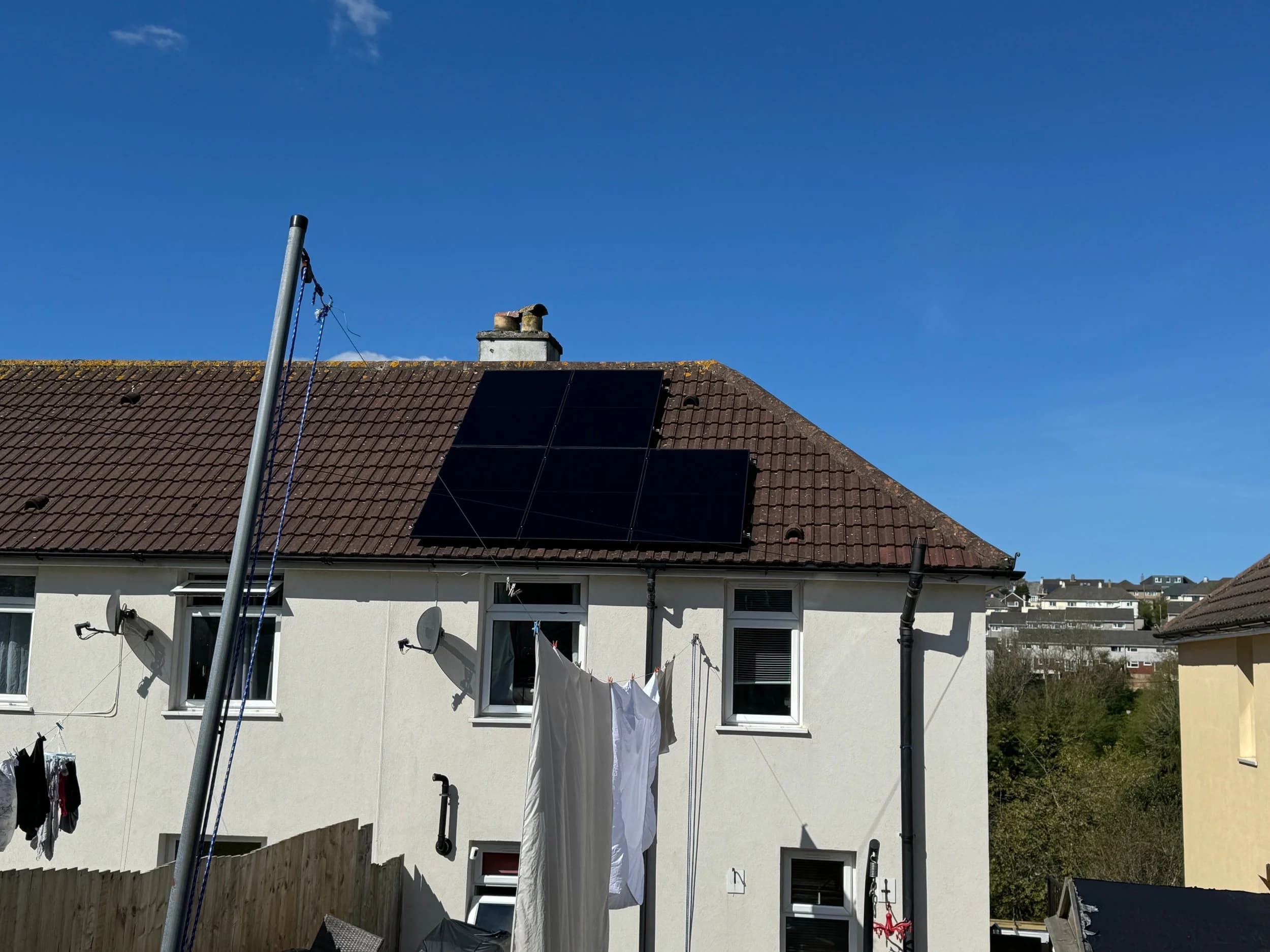 Solar panels on the roof of a semi-detached house at Channel Park, Plymouth