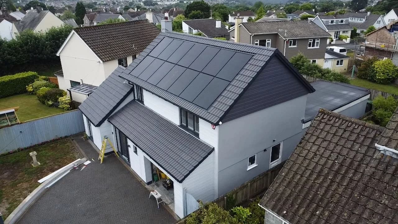 Aerial view of a house on Little Fancy Close, Plymouth, with black solar panels on the roof