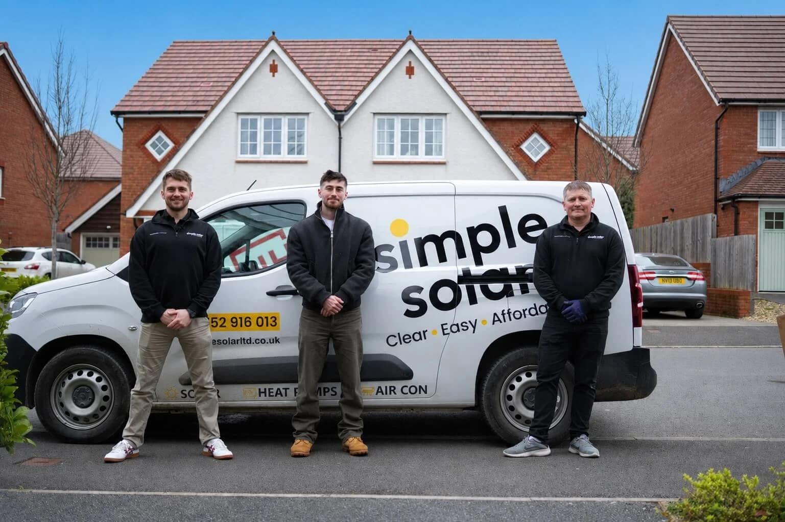Simple Solar team beside a branded Simple Solar van outside a home