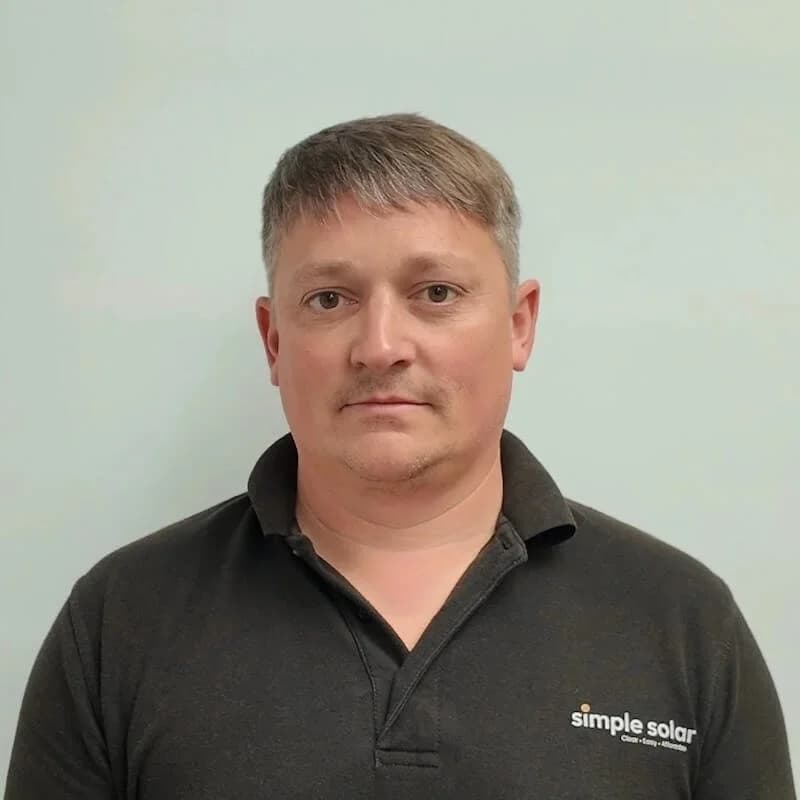 Ben Quick, Director at Simple Solar, photographed wearing a Simple Solar polo shirt.