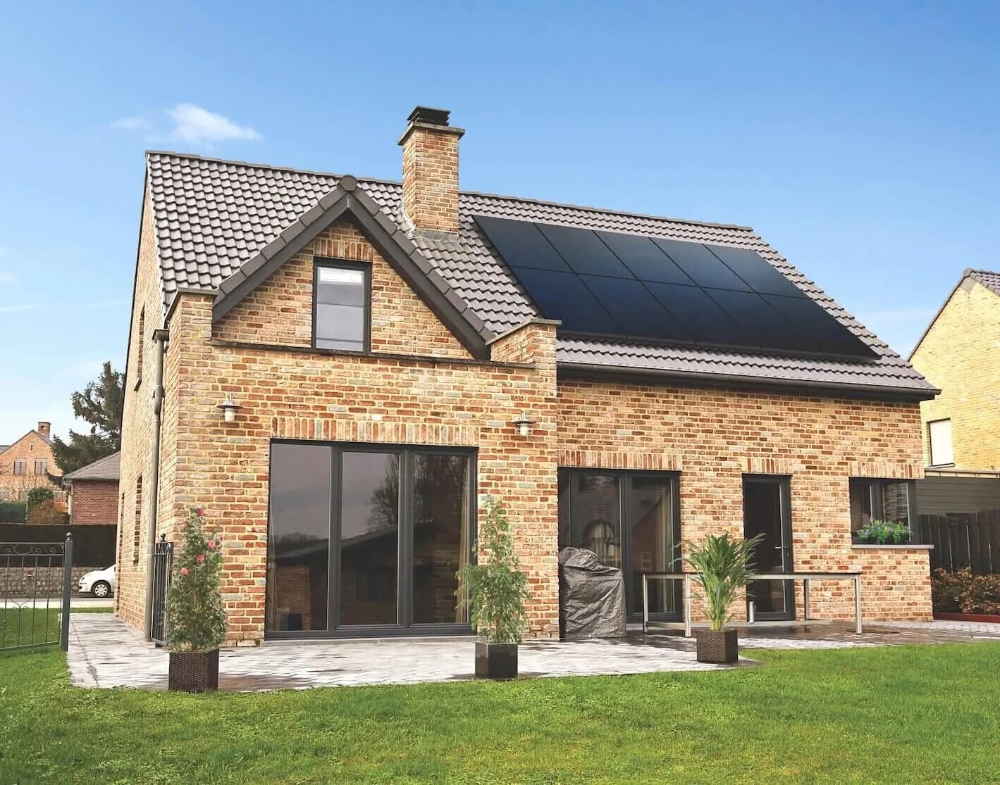 SunPower all-black solar panels installed on a brick house